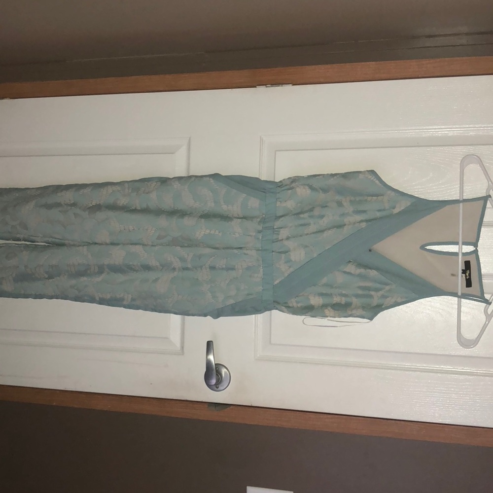 A dark turquoise jump suit